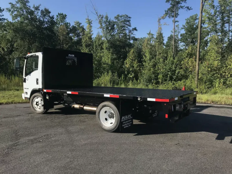 Increase hauling efficiency with a dovetail truck flatbed for reliable loading every time